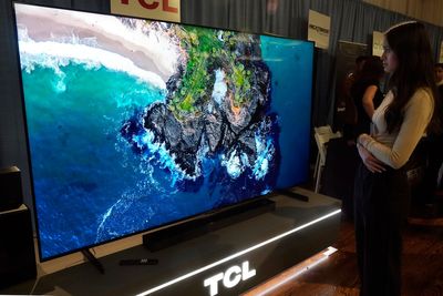 A TV as big as a bed? With the holidays approaching, stores stock more supersize sets