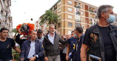 Angry flood survivors hurl mud and insults at Spain’s King as he visits town