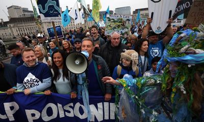 Thousands of blue-clad protesters join London march for clean water