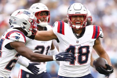 WATCH: Patriots LB Jahlani Tavai robs Titans scoring drive with interception