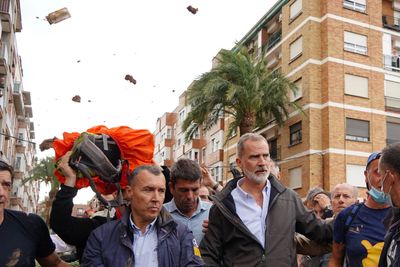 Spain's King And Queen Splattered With Mud During Visit To Flood-Ravaged Town