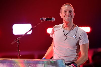 Coldplay’s Chris Martin falls through trap door on stage while performing in Melbourne