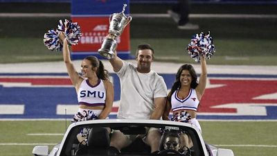 Bryson DeChambeau Shares U.S. Open Trophy With SMU Students During Game