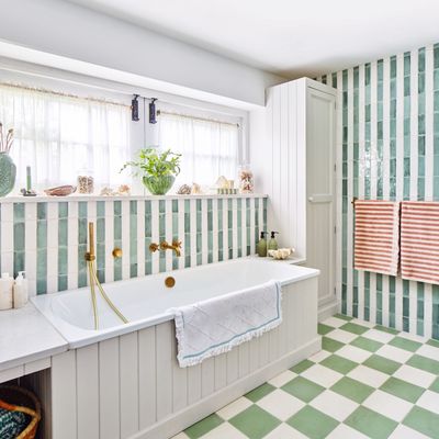 A garage playroom was completely transformed into vibrant yet calming ensuite bathroom