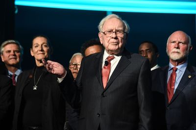 Berkshire Hathaway is dumping Apple stock and building its cash stockpile to record highs because Warren Buffett believes the government will raise capital gains taxes soon