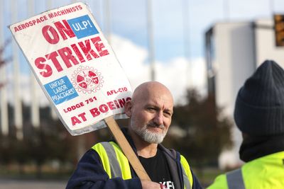 Striking machinists grudgingly OK Boeing's latest contract offer