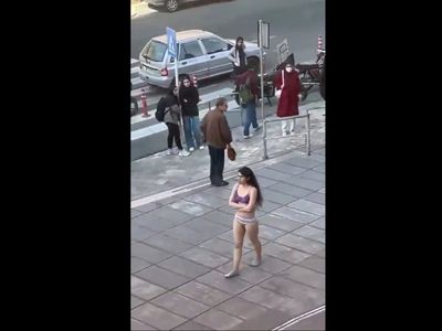 UN warns Iran the world is watching its response to woman who stripped to protest