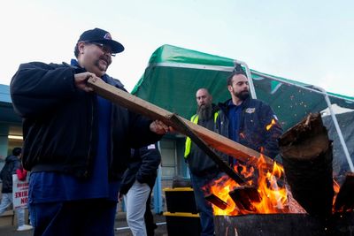 Boeing factory workers vote to end seven-week strike and accept pay deal