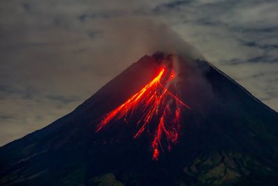 Indonesia volcano: Rescuers dig through ash for survivors after eruption kills nine