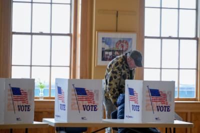 Long Lines Form At Polling Locations Across The Country