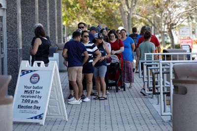 US voters cast ballots with security tight as election campaign nears end