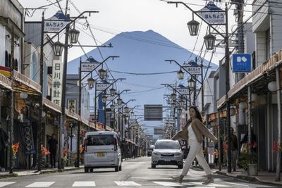 Snow Seen On Mount Fuji After Record Time Without