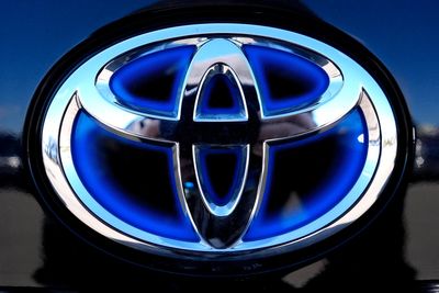 Hit by scandal, Japan's top automaker Toyota reports lower profits