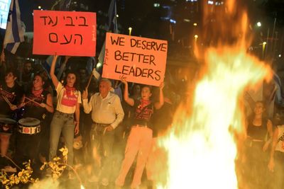 Protests erupt in Israel after Netanyahu fires defence minister