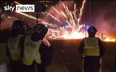 Bonfire ‘warzone’ as petrol bombs and fireworks hurled at police across UK cities