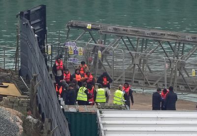 Two bodies found as more than 50 migrants rescued in English Channel