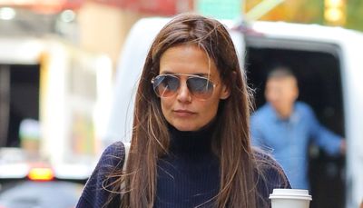 Katie Holmes channels British heritage dressing in fabulous yellow plaid pants and high-neck navy sweater