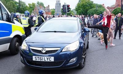 Man who stopped drivers during UK riots to check they were white is jailed