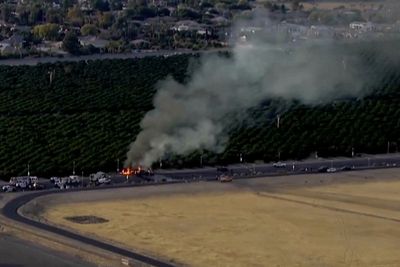 5 people are killed in Arizona when a plane crashes through an airport fence and collides with a car