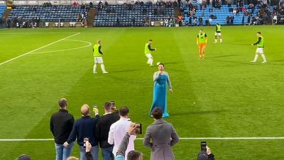 Moment man dressed as Elsa from Frozen sings Let It Go on pitch during FA Cup clash