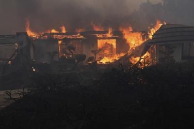 Couple Evacuates Home Due To California Wildfire Threat