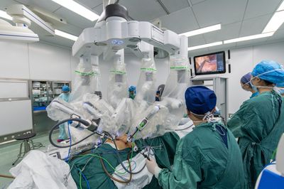 Next time you go under the knife, there's a good chance a robot will hold the scalpel