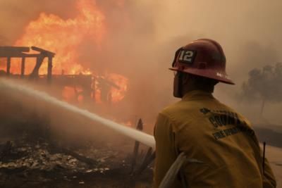 Residents In Camarillo Defend Homes Against Approaching Mountain Fire