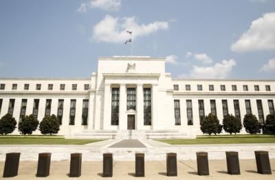 Federal Reserve Officials Predict Potential Rate Cuts In 2025