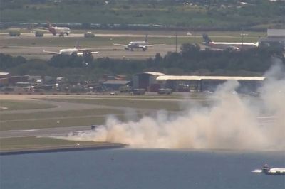 Runway fire breaks out at Sydney Airport after emergency landing