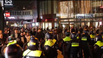 Amsterdam police say 5 hospitalized and 62 detained after attacks on Israeli soccer fans