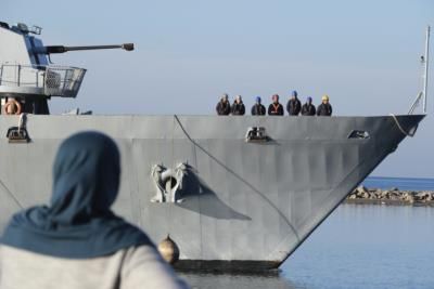 Italian Navy Ship Transfers Migrants To Albania