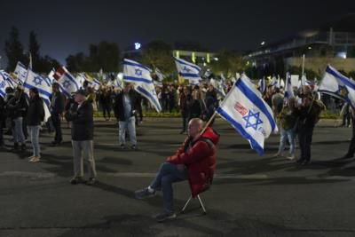 Israeli Defense Minister Steps Down, Sparks Protests