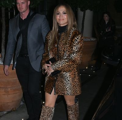 Jennifer Lopez Doubles Down on the Leopard Print Trend in a Coat Dress and Slouchy Boots