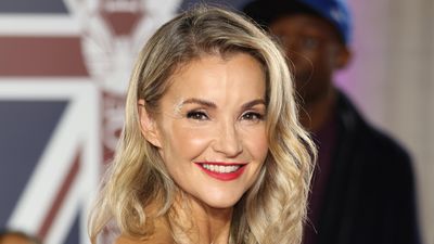 Helen Skelton’s cranberry red jumper dress, relaxed coat and flat boots have got us excited for festive styling with a comfy twist