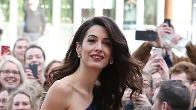 I've been looking for Christmas party outfits, and Amal Clooney's asymmetric jumpsuit is the best by miles