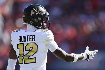 Travis Hunter hilariously shoved a tortilla in his pants after a Texas Tech fan threw it on the field