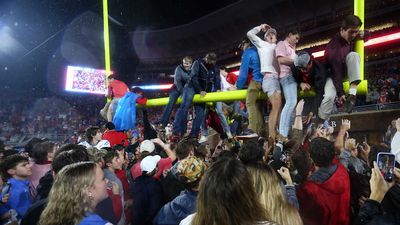 Exuberant Ole Miss Fans Storm Field Before Upset Win Against Georgia Is Even Over