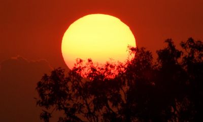 Australia’s heatwave to continue as east coast braces for possible severe storms