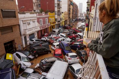 AP PHOTOS: Death by water, burial by mud. Images of Spain's floods of the century