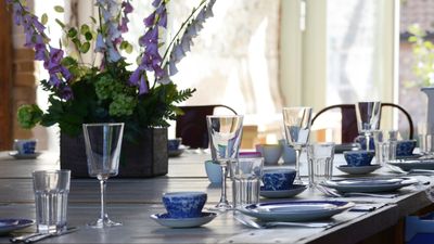 5 things that always make a dining table look cluttered, including crowded place settings, busy tablecloths and home tech – and what to do instead