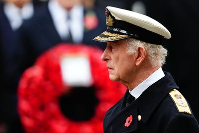 King lays wreath at Cenotaph as nation falls silent in remembrance