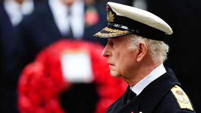 King lays first wreath as Kate and William pay respects in London on Remembrance Sunday