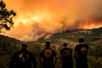 Wildfires roar on both US coasts