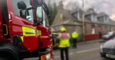 Fire engine in crash with two cars while travelling under blue lights