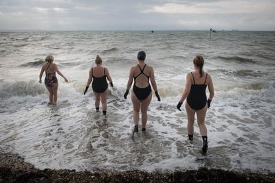 Win for wild swimmers as government pledges crackdown on water pollution in bathing spots