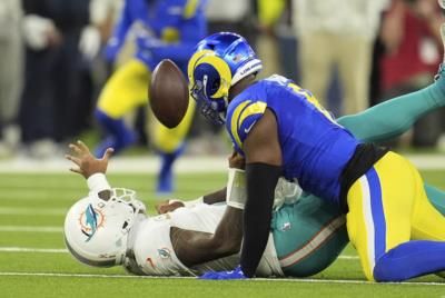 Dolphins Defeat Rams In Gritty Victory