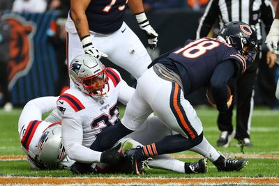 WATCH: Patriots LB smiles while helping up hopeless-looking Caleb Williams