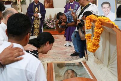 A former prosecutor in southern Mexico is arrested in the grisly decapitation of a mayor