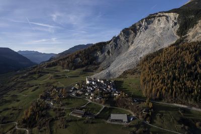 Swiss village evacuated amid fears it will be swallowed up by giant landslide