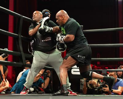 Photos: Jake Paul vs. Mike Tyson open workouts